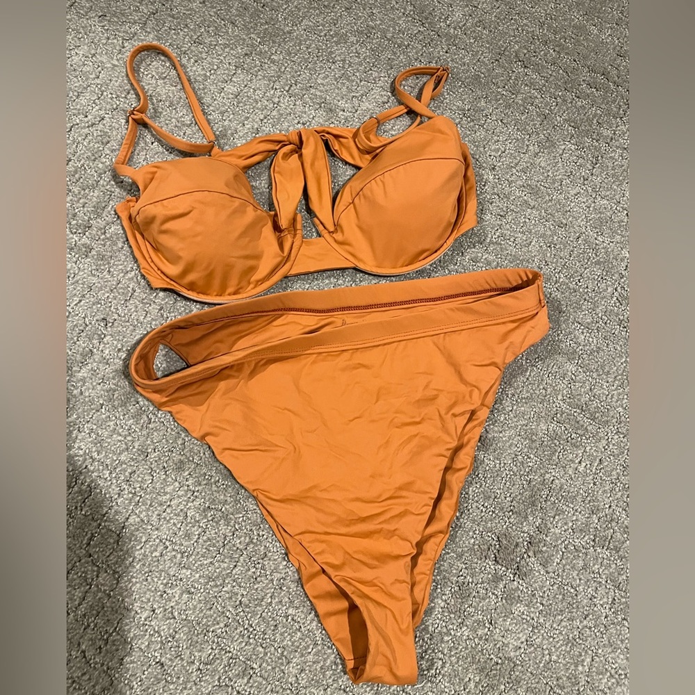 Orange Dippin daisy’s swimsuit